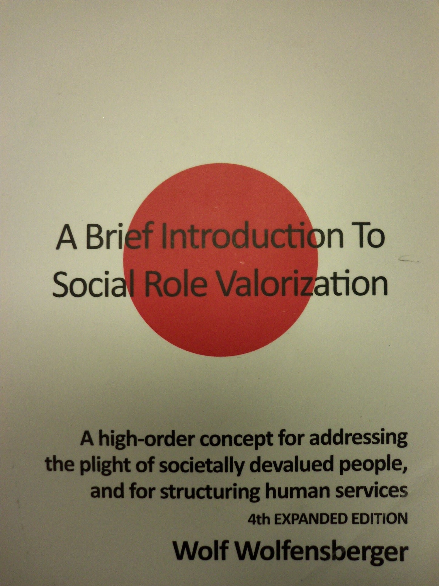 A Brief Introduction to Social Role Valorization: A high-order concept for addressing the plight of societally devalued people, and for structuring human services [paperback] Wolf Wolfensberger PhD, 1934-2011 [Jan 01, 2013]